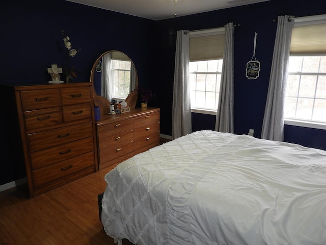 bedroom featuring hardwood / wood-style flooring