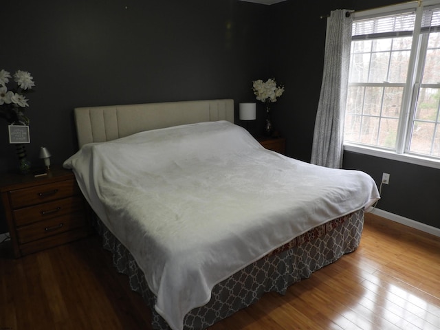 bedroom featuring hardwood / wood-style flooring