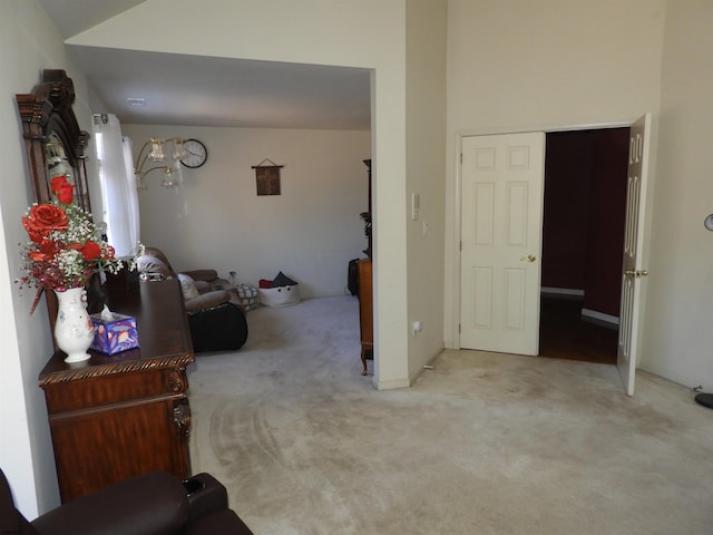 corridor with light colored carpet