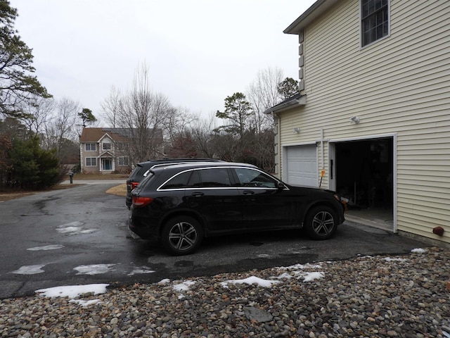 view of home's exterior with a garage