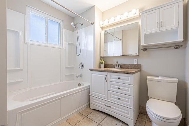 full bathroom with tile patterned flooring, vanity, bathing tub / shower combination, and toilet