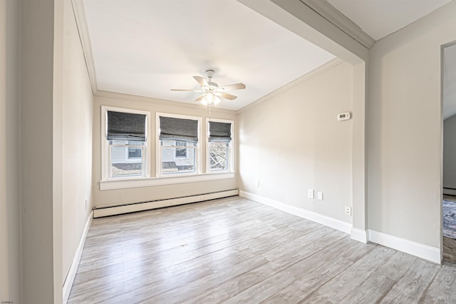 empty room featuring crown molding, a baseboard heating unit, ceiling fan, and light hardwood / wood-style floors