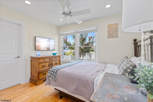 bedroom featuring wood-type flooring and ceiling fan