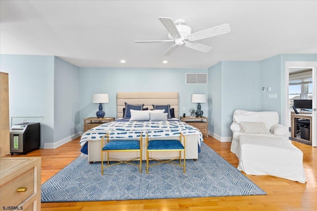 bedroom featuring ceiling fan and light wood-type flooring