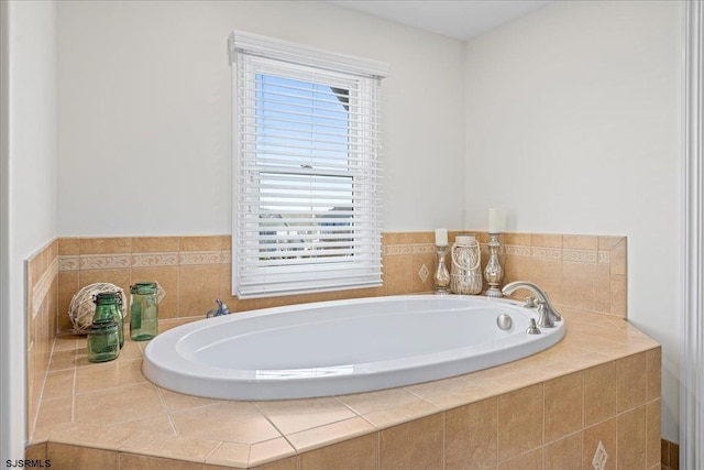 bathroom with tiled tub