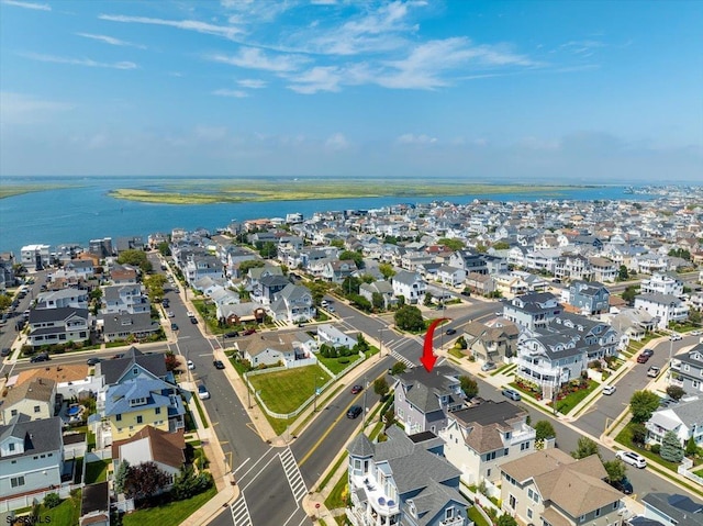 drone / aerial view featuring a water view