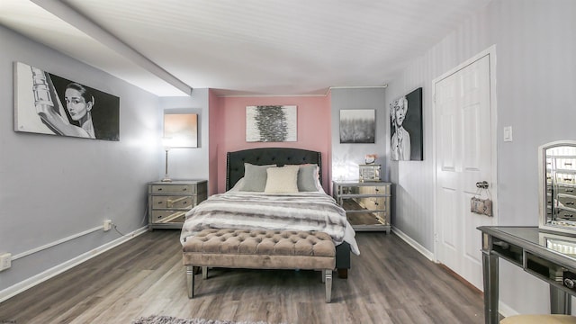 bedroom featuring dark hardwood / wood-style flooring