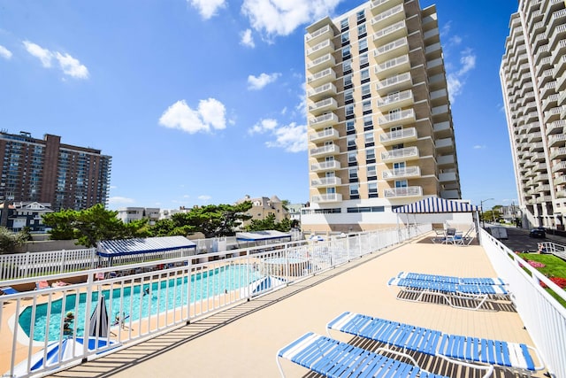 view of pool featuring a patio area