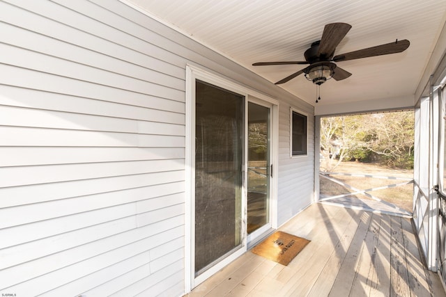 wooden terrace with ceiling fan