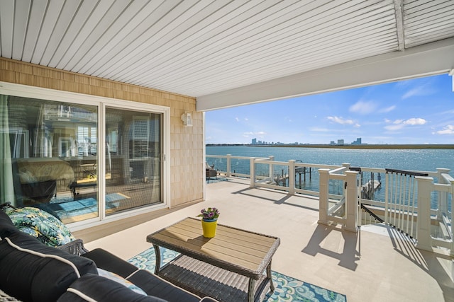 view of patio / terrace featuring a water view