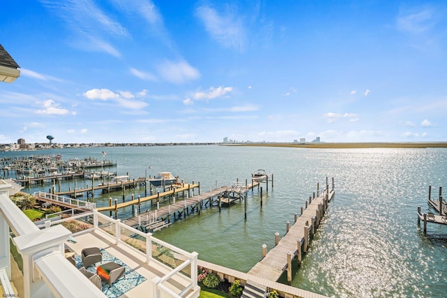 dock area featuring a water view