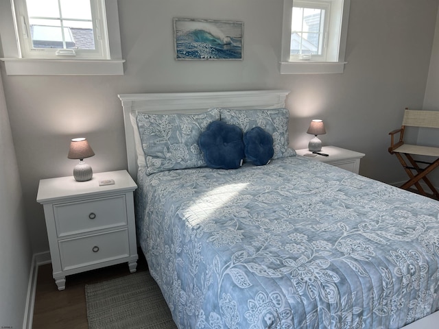 bedroom with wood-type flooring