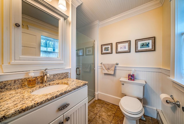 bathroom featuring vanity, a baseboard heating unit, toilet, a shower with door, and crown molding