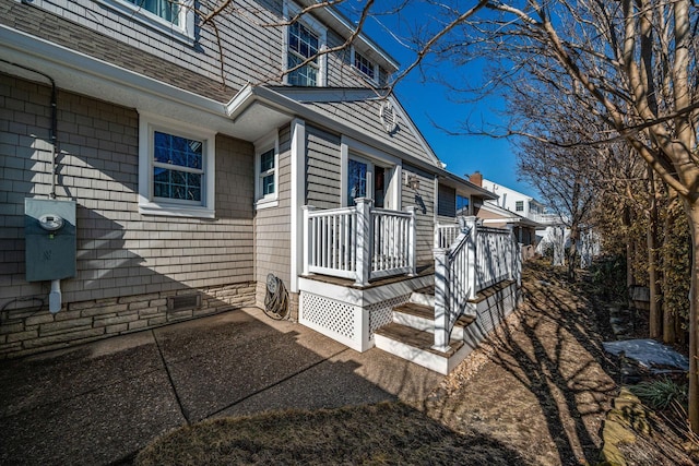 doorway to property featuring a patio