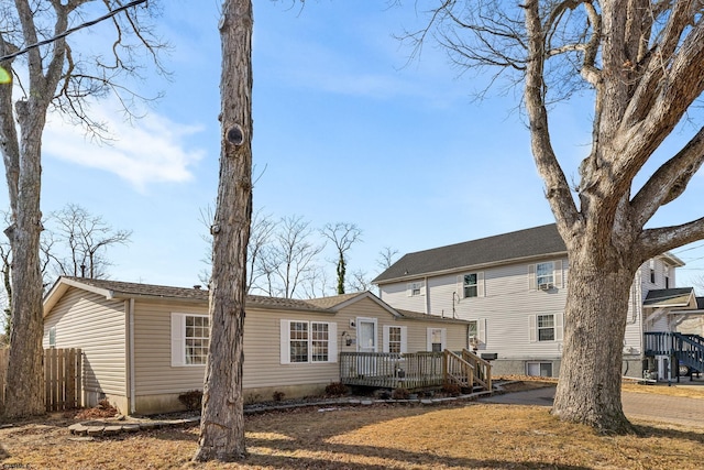 rear view of property with a deck