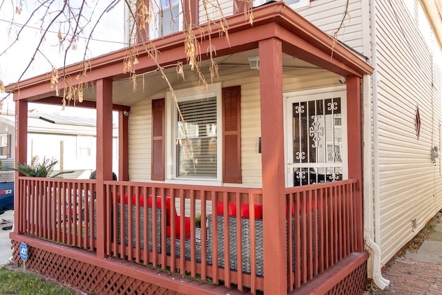 wooden terrace with a porch