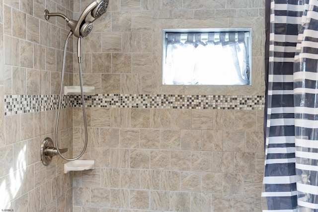 bathroom featuring a shower with curtain