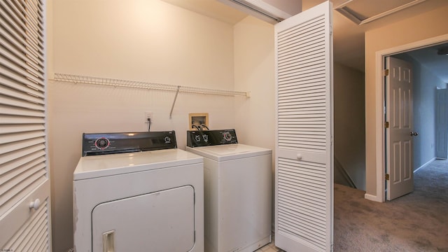 laundry room featuring separate washer and dryer and carpet flooring