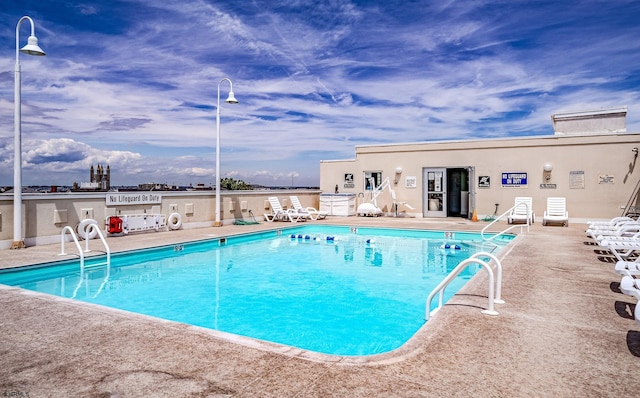 view of pool with a patio