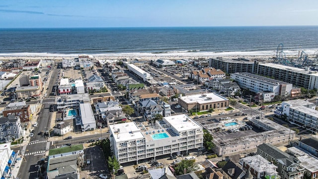 aerial view featuring a beach view and a water view