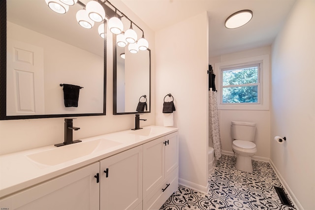 full bathroom with shower / tub combo, vanity, toilet, and tile patterned flooring