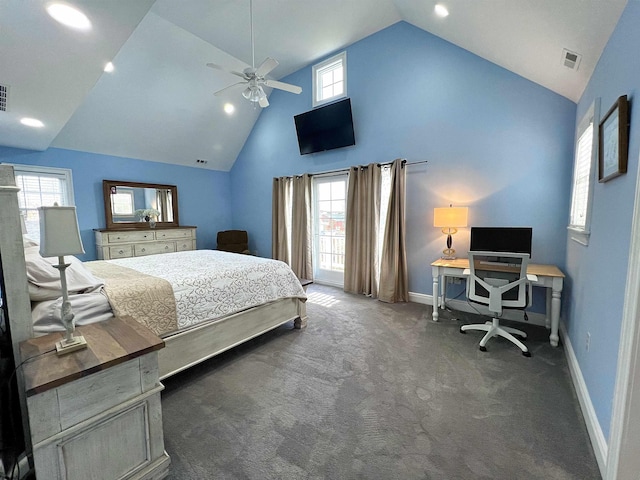 carpeted bedroom with ceiling fan and high vaulted ceiling