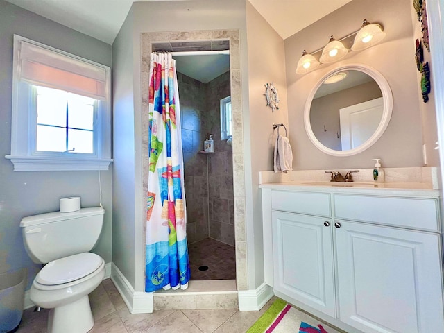 bathroom with a shower with curtain, tile patterned floors, vanity, and toilet