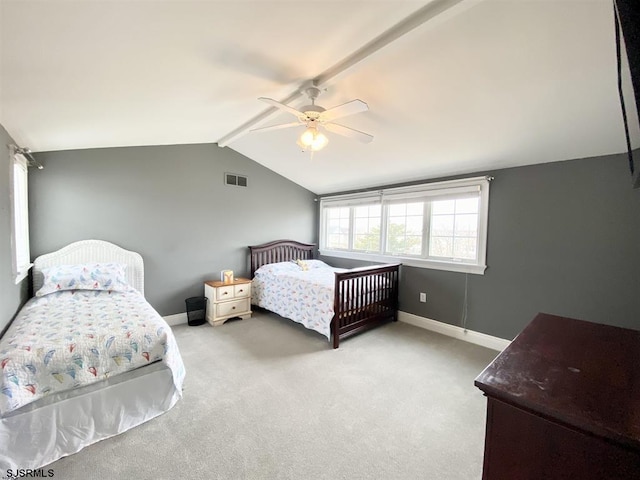 bedroom with lofted ceiling with beams, light carpet, and ceiling fan