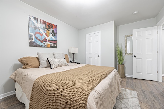 bedroom featuring hardwood / wood-style flooring