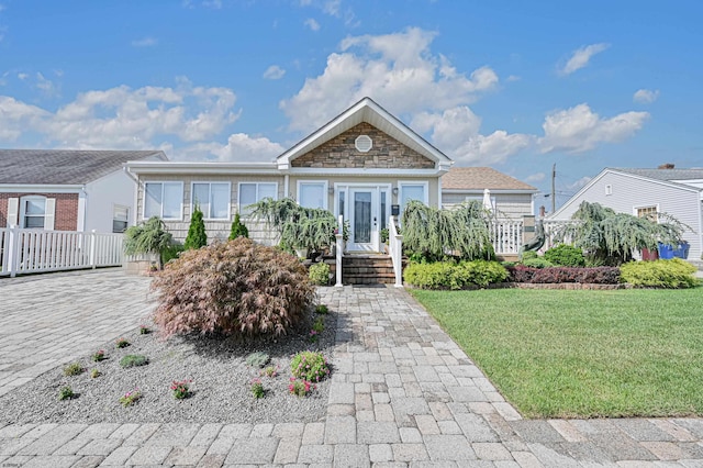 view of front of house with a front lawn