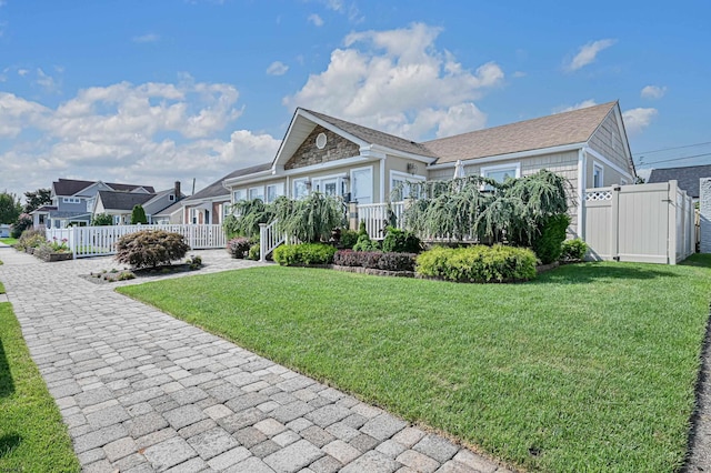 view of front of property with a front lawn