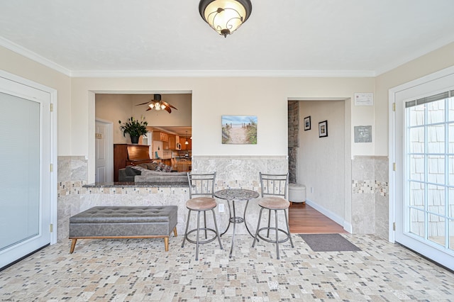 living room with ornamental molding