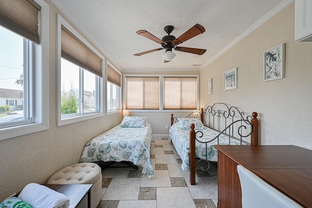 bedroom featuring crown molding and ceiling fan