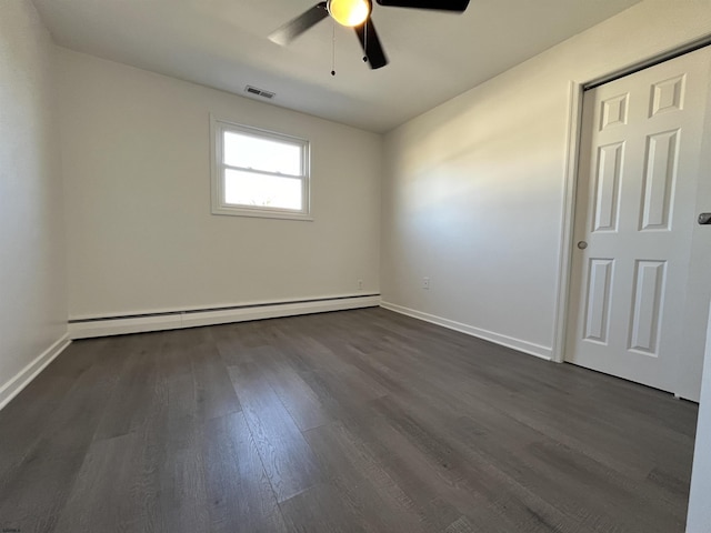 unfurnished room with a baseboard radiator, dark hardwood / wood-style floors, and ceiling fan