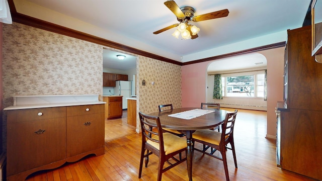 dining room featuring ceiling fan and light wood-type flooring