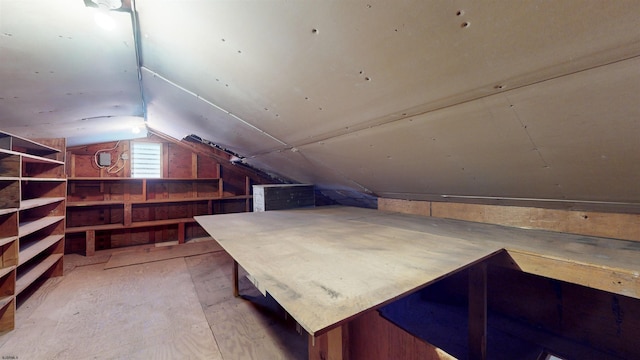 bonus room featuring vaulted ceiling