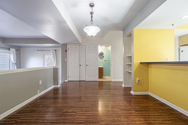 foyer entrance with dark hardwood / wood-style flooring