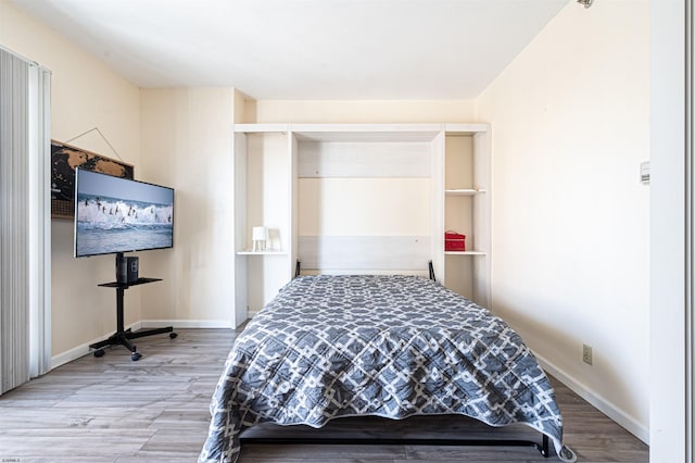 bedroom featuring hardwood / wood-style floors