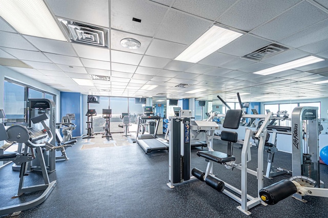 gym with a drop ceiling