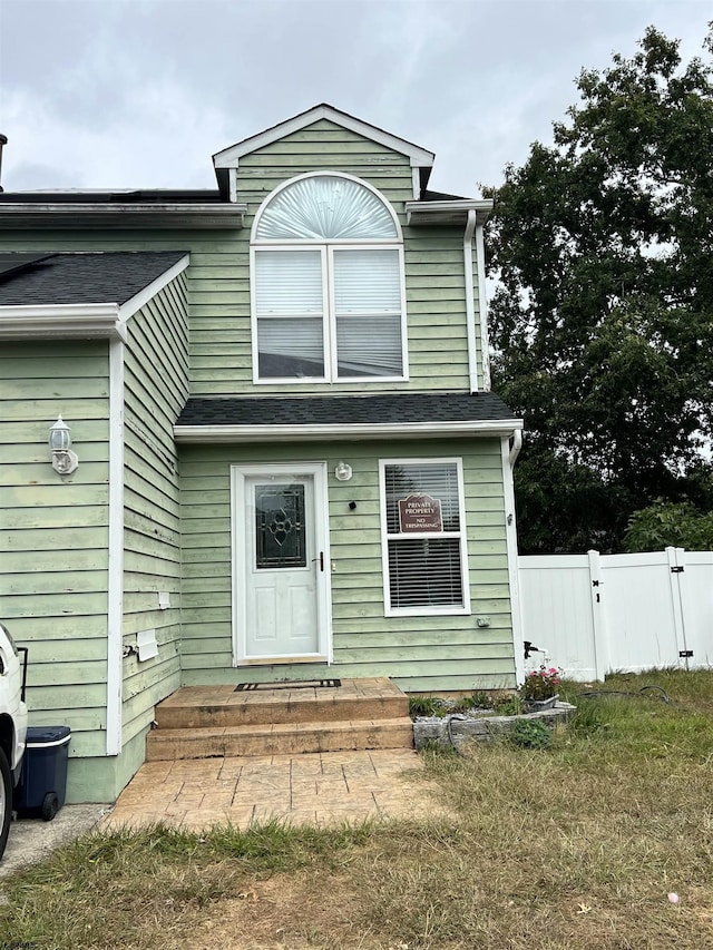 view of front of home with a front yard