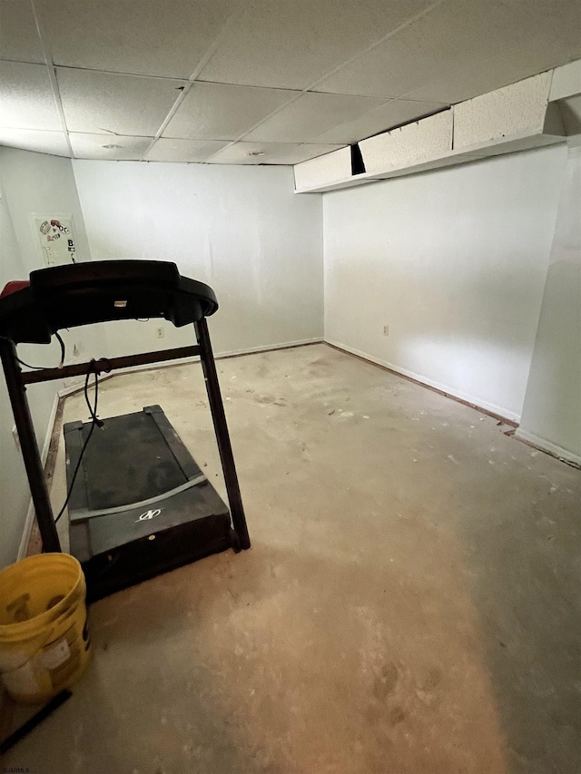 exercise area with a paneled ceiling