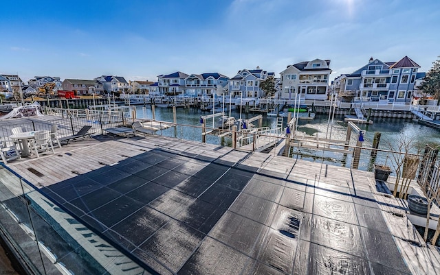 view of dock with a water view