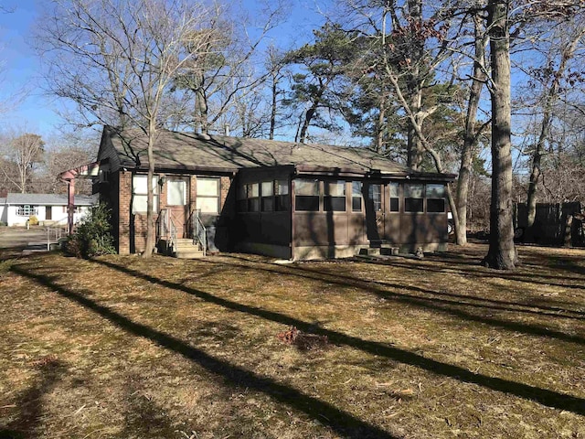 exterior space with a front lawn