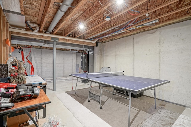 game room with concrete flooring