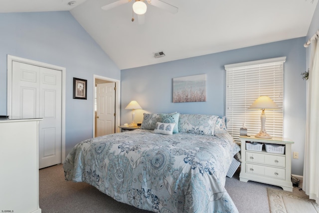 carpeted bedroom featuring vaulted ceiling and ceiling fan