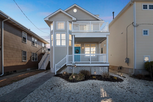 view of property featuring a porch