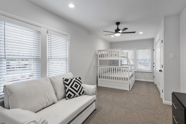 carpeted bedroom featuring ceiling fan