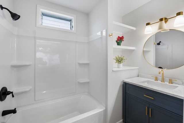 bathroom featuring vanity and washtub / shower combination