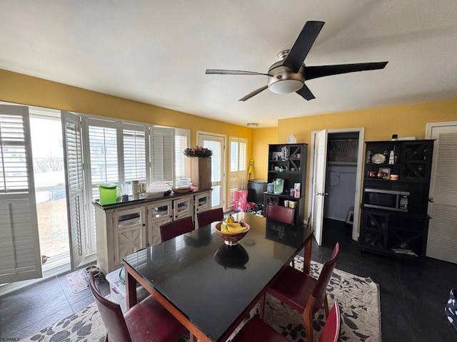 dining area featuring ceiling fan