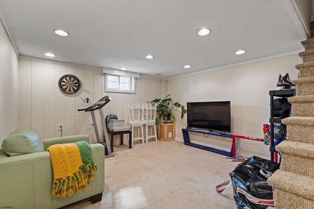 living room featuring crown molding and carpet floors